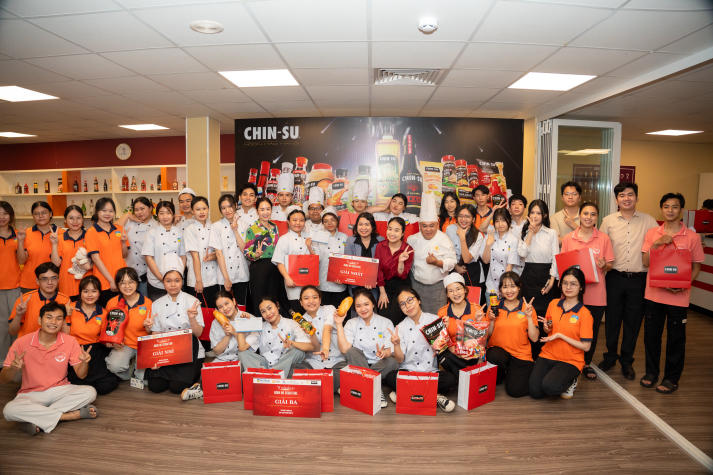 Restaurant and Catering Management students engaged in a signature Bánh mì workshop guided by a culinary expert 105